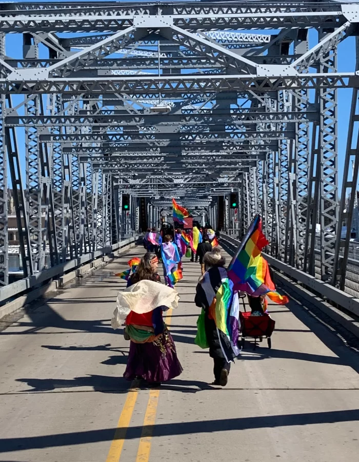 St Paddy's Parade with pride flags on Steelbridge